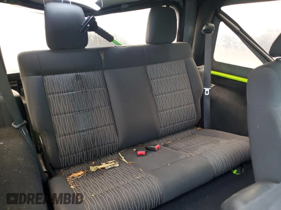 2012 Jeep Wrangler Sport with VIN 1C4AJWAG2CL233722, listed as a Copart auction lot 61125095 with 49,864 mi miles and Salvage title. Bid and sale history available at DreamBid. Image 10.