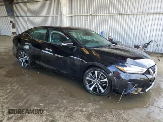 2023 Nissan Maxima SV z VIN 1N4AA6CVXPC511712, wystawiony jako Copart lot #54992095 z przebiegiem 41 118 mil mil oraz Czysty tytuł • Clean title. Historia ofert i sprzedaży dostępna na DreamBid. Obrazek 4.