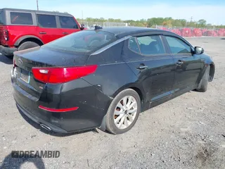 2015 Kia Optima LX with VIN KNAGM4A71F5630673, listed as a IAAI auction lot 42106584 with 245,005 mi miles and . Bid and sale history available at carsss.com. Image 4.