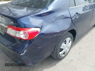 2013 Toyota Corolla L with VIN 5YFBU4EE5DP095580, listed as a IAAI auction lot 42147355 with 180,447 mi miles. Bid and sale history available at carsss.com. Image 6.