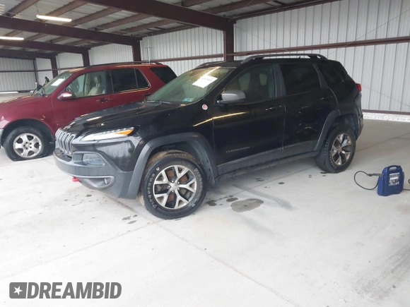 2014 Jeep Cherokee Trailhawk with VIN 1C4PJMBS3EW150366, listed as a IAAI auction lot 41971035 with 90,994 mi miles. Bid and sale history available at carsss.com. Image 16.