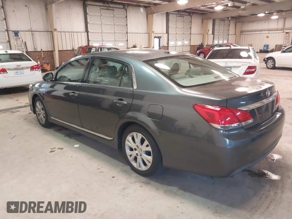 2011 Toyota Avalon with VIN 4T1BK3DB6BU432597, listed as a IAAI auction lot 41625819 with 233,536 mi miles and . Bid and sale history available at DreamBid. Image 3.