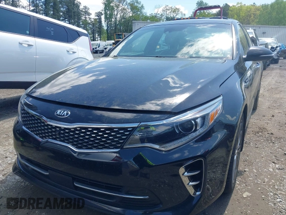 2016 Kia Optima SXL Turbo with VIN 5XXGV4L23GG117486, listed as a IAAI auction lot 41998300 with 142,477 mi miles. Bid and sale history available at carsss.com. Image 6.