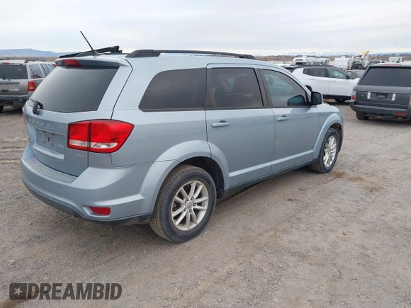 2013 Dodge Journey SXT with VIN 3C4PDDBG2DT724768, listed as a IAAI auction lot 40926457 with 150,862 mi miles and . Bid and sale history available at DreamBid. Image 4.