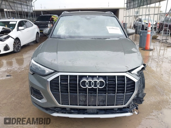 2020 Audi Q3 Premium z VIN WA1AECF30L1052472, wystawiony jako IAAI lot #41886809 z przebiegiem 101 600 mil mil oraz . Historia ofert i sprzedaży dostępna na DreamBid. Obrazek 12.