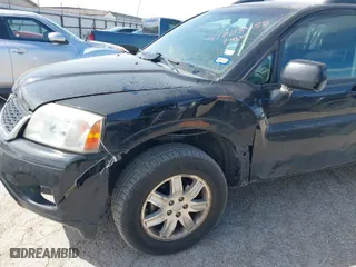 2011 Mitsubishi Endeavor LS with VIN 4A4JN2AS0BE026338, listed as a IAAI auction lot 41703458 with 140,986 mi miles. Bid and sale history available at carsss.com. Image 6.