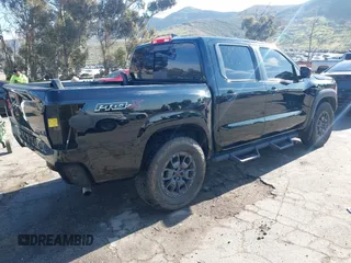 2023 Nissan Frontier Pro-X with VIN 1N6ED1EJ6PN619651, listed as a IAAI auction lot 41838415 with 69,819 mi miles and . Bid and sale history available at DreamBid. Image 4.