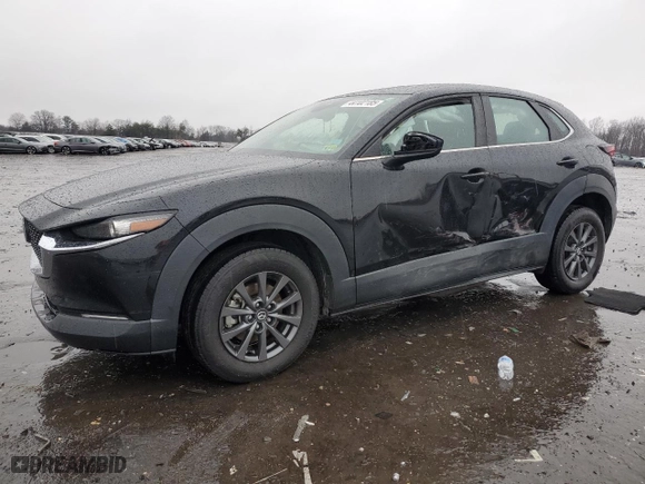 2020 Mazda CX-30 with VIN 3MVDMABL9LM125324, listed as a Copart auction lot 44102185 with 58,557 mi miles and Salvage Title. Bid and sale history available at carsss.com. Image 1.