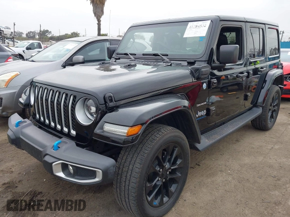 2023 Jeep Wrangler Sahara z VIN 1C4JJXP6XPW556327, wystawiony jako IAAI lot #41784532 z przebiegiem 39 918 mil mil oraz . Historia ofert i sprzedaży dostępna na DreamBid. Obrazek 17.