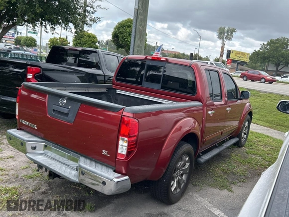 2014 Nissan Frontier SV with VIN 1N6AD0ER6EN738893, listed as a Copart auction lot 59728175 with 242,747 mi miles and Clean title. Bid and sale history available at DreamBid. Image 4.