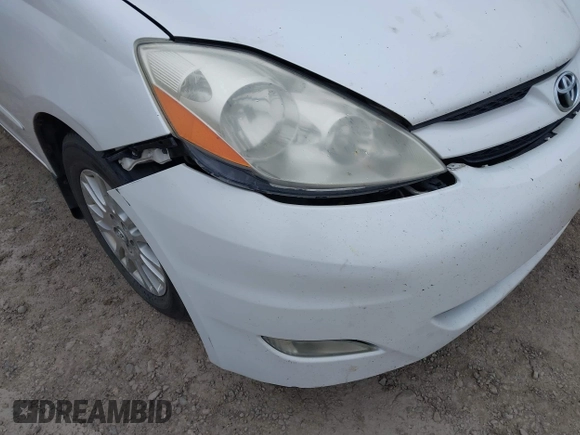 2007 Toyota Sienna XLE with VIN 5TDZK22C57S081282, listed as a IAAI auction lot 42154188 with 245,815 mi miles. Bid and sale history available at carsss.com. Image 16.
