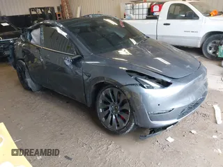 2022 Tesla Model Y Performance z VIN 7SAYGDEFXNF380656, wystawiony jako IAAI lot #41554717 z przebiegiem 50 947 mil mil oraz . Historia ofert i sprzedaży dostępna na DreamBid. Obrazek 1.