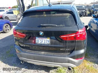 2018 BMW X1 sDrive28i with VIN WBXHU7C39J5L07129, listed as a IAAI auction lot 41472014 with 56,486 mi miles. Bid and sale history available at carsss.com. Image 17.