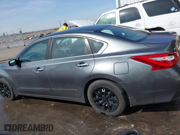 2016 Nissan Altima SV with VIN 1N4AL3AP5GC166005, listed as a IAAI auction lot 41795548 with 111,942 mi miles and . Bid and sale history available at DreamBid. Image 14.