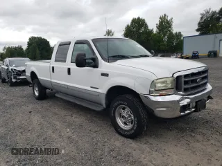 2002 Ford F-350 XL with VIN 3FTSW31F32MA17869, listed as a Copart auction lot 71828914 with 230,191 mi miles and Salvage Title. Bid and sale history available at DreamBid. Image 4.