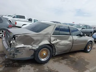 2003 Cadillac DeVille z VIN 1G6KD54Y63U223640, wystawiony jako IAAI lot #41704549 z przebiegiem 127 981 mil mil oraz . Historia ofert i sprzedaży dostępna na DreamBid. Obrazek 13.