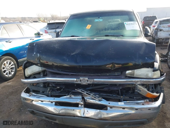 1999 Chevrolet Silverado 1500 LS with VIN 2GCEC19T4X1165256, listed as a IAAI auction lot 41236272 with 77,004 mi miles. Bid and sale history available at carsss.com. Image 13.