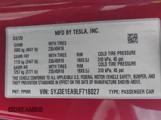 2020 Tesla Model 3 Standard Range Plus with VIN 5YJ3E1EA9LF718027, listed as a IAAI auction lot 41679320 with 68,987 mi miles. Bid and sale history available at carsss.com. Image 9.