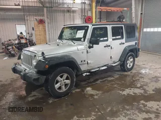 2007 Jeep Wrangler Unlimited X with VIN 1J4GA39167L147516, listed as a IAAI auction lot 41617025 with 119,572 mi miles and . Bid and sale history available at DreamBid. Image 18.