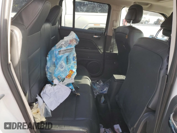 2014 Jeep Patriot Latitude z VIN 1C4NJPFAXED862881, wystawiony jako Copart lot #41519835 z przebiegiem 100 695 mil mil oraz Szkoda całkowita • Salvage title. Historia ofert i sprzedaży dostępna na DreamBid. Obrazek 11.