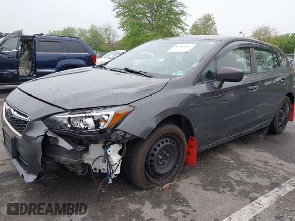 2019 Subaru Impreza with VIN 4S3GTAA69K1711062, listed as a IAAI auction lot 42187136 with 91,423 mi miles and . Bid and sale history available at DreamBid. Image 17.