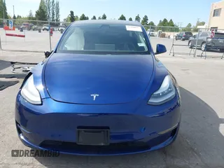 2020 Tesla Model Y Long Range with VIN 5YJYGDEE1LF006227, listed as a IAAI auction lot 42100833 with 49,761 mi miles and . Bid and sale history available at DreamBid. Image 13.
