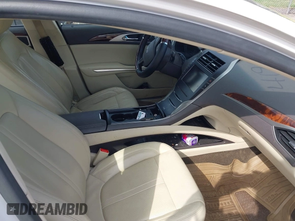 2015 Lincoln MKZ с VIN 3LN6L2G96FR615416, выставлен на аукционе IAAI как лот 41962610 с пробегом 61 265 миль миль и . История ставок и продаж доступна на DreamBid. Изображение 5.
