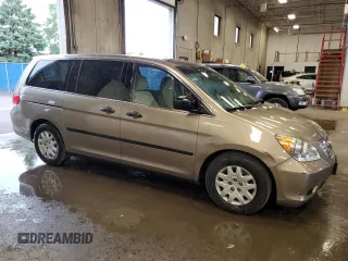 2009 Honda Odyssey LX with VIN 5FNRL38259B018546, listed as a Copart auction lot 62142015 with 162,459 mi miles and Salvage title. Bid and sale history available at DreamBid. Image 4.