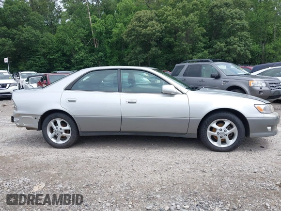 2001 Lexus ES 300 z VIN JT8BF28G910291019, wystawiony jako IAAI lot #42488530 z przebiegiem 170 168 mil mil oraz . Historia ofert i sprzedaży dostępna na DreamBid. Obrazek 13.