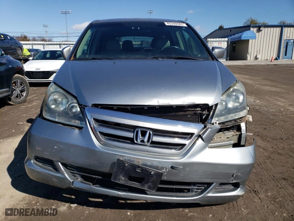 2007 Honda Odyssey EX-L with VIN 5FNRL38647B132859, listed as a Copart auction lot 45590585 with 76,878 mi miles and Salvage Title. Bid and sale history available at carsss.com. Image 5.