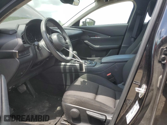 2023 Mazda CX-30 S with VIN 3MVDMBAM6PM513651, listed as a Copart auction lot 57432955 with 49,851 mi miles and Salvage title. Bid and sale history available at DreamBid. Image 7.