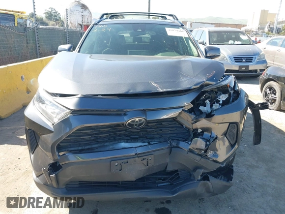 2019 Toyota RAV4 LE with VIN JTMG1RFV3KD025974, listed as a IAAI auction lot 41879264 with 131,933 mi miles and . Bid and sale history available at DreamBid. Image 12.