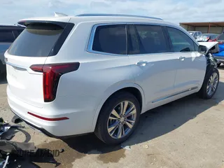 2024 Cadillac XT6 FWD Premium Luxury with VIN 1GYKPCRS9RZ726694, listed as a IAAI auction lot 42057522 with 19,312 mi miles and . Bid and sale history available at DreamBid. Image 4.