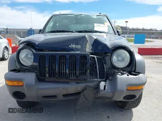2003 Jeep Liberty Sport with VIN 1J4GL48KX3W530569, listed as a IAAI auction lot 41857397 with 172,303 mi miles. Bid and sale history available at carsss.com. Image 12.