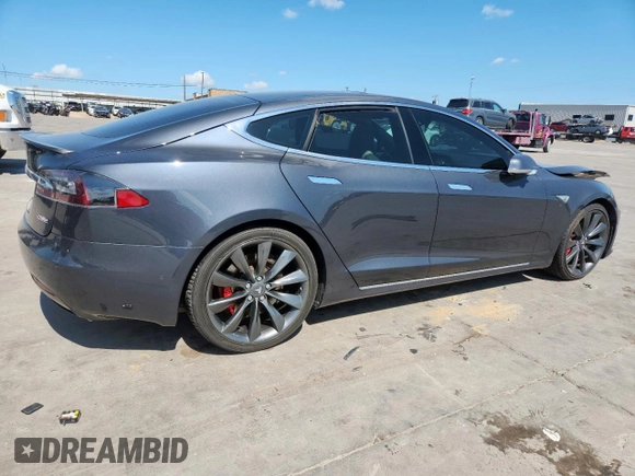 2016 Tesla Model S 90D z VIN 5YJSA1E40GF145137, wystawiony jako Copart lot #62027605 z przebiegiem 92 060 mil mil oraz Szkoda całkowita • Salvage title. Historia ofert i sprzedaży dostępna na DreamBid. Obrazek 3.