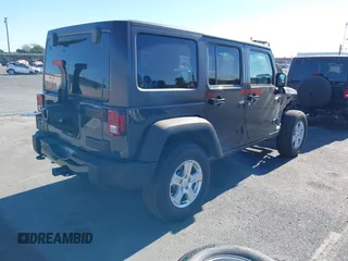 2018 Jeep Wrangler JK Unlimited Sport S with VIN 1C4BJWDG4JL868700, listed as a IAAI auction lot 41349566 with 68,539 mi miles. Bid and sale history available at carsss.com. Image 4.