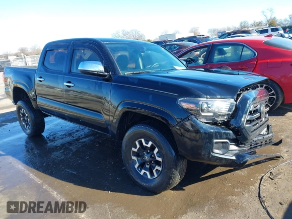 2018 Toyota Tacoma SR with VIN 5TFCZ5ANXJX124991, listed as a IAAI auction lot 41136867 with 57,980 mi miles and . Bid and sale history available at carsss.com. Image 1.