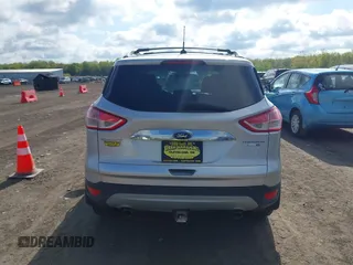 2015 Ford Escape Titanium z VIN 1FMCU9J99FUC75852, wystawiony jako IAAI lot #42171467 z przebiegiem 113 322 mil mil oraz . Historia ofert i sprzedaży dostępna na DreamBid. Obrazek 16.