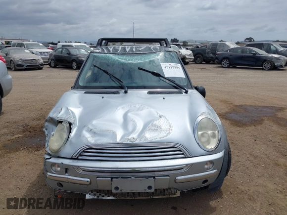 2004 MINI Hardtop with VIN WMWRC33434TJ57506, listed as a IAAI auction lot 42117581 with 148,483 mi miles and . Bid and sale history available at DreamBid. Image 12.