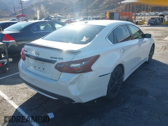 2018 Nissan Altima S with VIN 1N4AL3AP5JC294610, listed as a IAAI auction lot 41436696 with 124,835 mi miles and . Bid and sale history available at DreamBid. Image 4.