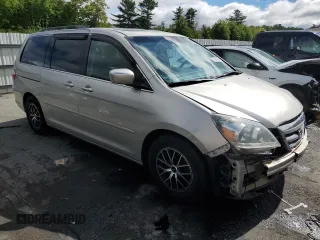 2005 Honda Odyssey Touring z VIN 5FNRL38835B071258, wystawiony jako Copart lot #57878295 z przebiegiem 143 474 mil mil oraz Szkoda całkowita • Salvage title. Historia ofert i sprzedaży dostępna na DreamBid. Obrazek 4.