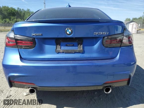 2015 BMW 3 Series 335i xDrive with VIN WBA3B9C53FP705486, listed as a Copart auction lot 57719445 with 76,148 mi miles and Salvage title. Bid and sale history available at DreamBid. Image 6.