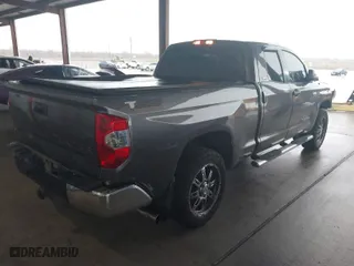 2014 Toyota Tundra 2WD Truck SR with VIN 5TFRY5F15EX166929, listed as a IAAI auction lot 41458810 with 142,152 mi miles. Bid and sale history available at carsss.com. Image 4.