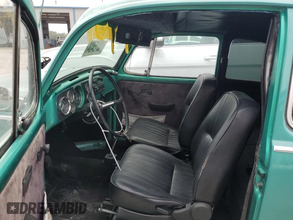 1969 Volkswagen Beetle with VIN 119682637V, listed as a Copart auction lot 70315404 with 59,148 mi miles and Salvage Title. Bid and sale history available at DreamBid. Image 7.