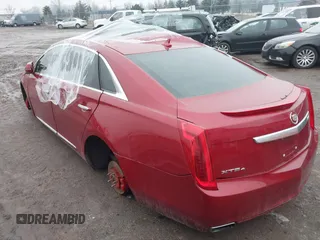 2013 Cadillac XTS Luxury with VIN 2G61R5S30D9157654, listed as a IAAI auction lot 41336844 with 159,419 mi miles and . Bid and sale history available at DreamBid. Image 3.