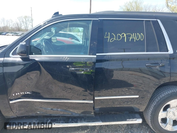 2018 Chevrolet Tahoe LT with VIN 1GNSKBKC7JR245565, listed as a IAAI auction lot 42097400 with 123,709 mi miles and . Bid and sale history available at DreamBid. Image 15.