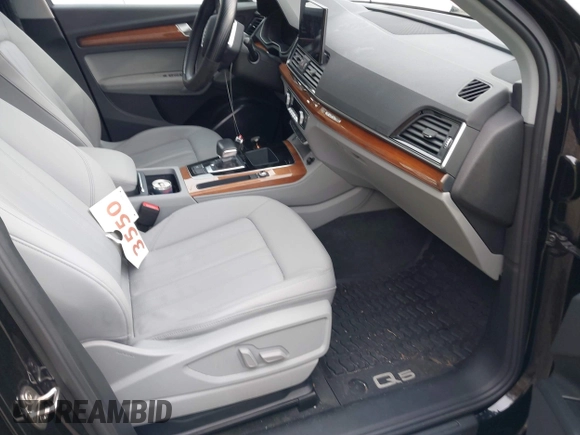 2022 Audi Q5 S line Premium Plus z VIN WA1EAAFY5N2027089, wystawiony jako IAAI lot #39093168 z przebiegiem 24 523 mil mil oraz . Historia ofert i sprzedaży dostępna na DreamBid. Obrazek 5.