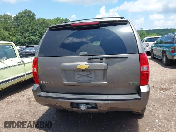 2012 Chevrolet Tahoe LT with VIN 1GNSCBE09CR229417, listed as a IAAI auction lot 42507793 with 164,877 mi miles and . Bid and sale history available at DreamBid. Image 16.