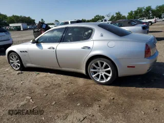 2005 Maserati Quattroporte z VIN ZAMCE39AX50019962, wystawiony jako Copart lot #59158555 z przebiegiem 24 013 mil mil oraz Czysty tytuł • Clean title. Historia ofert i sprzedaży dostępna na DreamBid. Obrazek 3.