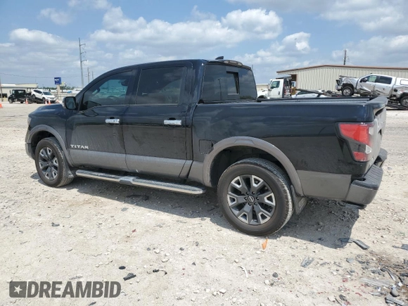 2023 Nissan Titan Platinum Reserve with VIN 1N6AA1EDXPN106467, listed as a Copart auction lot 53455215 with 56,061 mi miles and Salvage title. Bid and sale history available at DreamBid. Image 2.